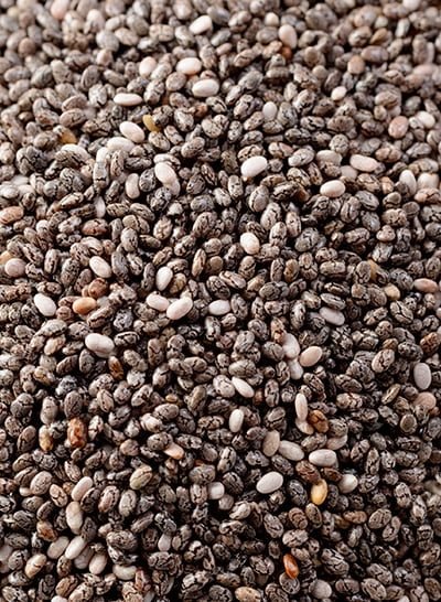 Small, round, semi-flat chia seeds